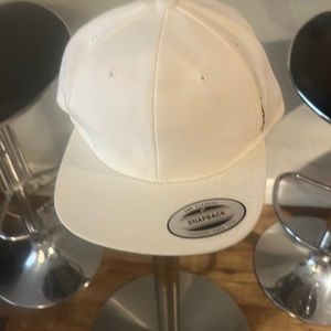 White makers mark hat